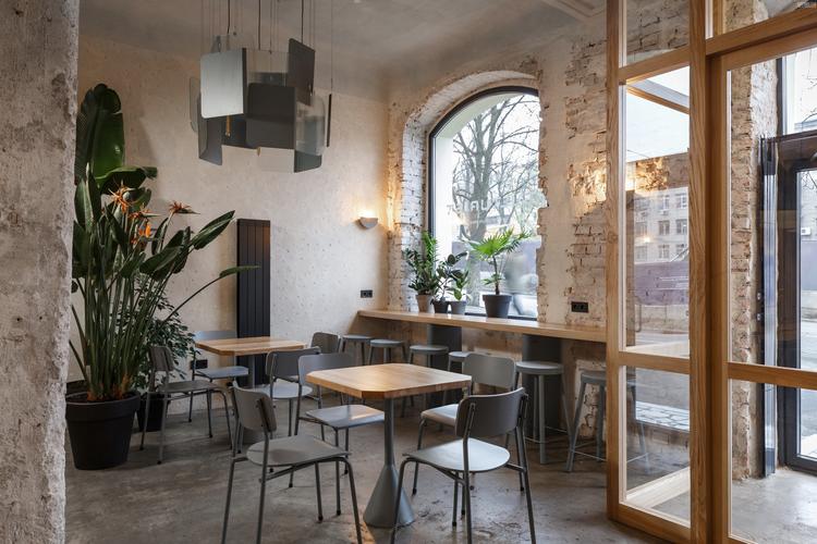 國外餐廳設計案例:一(yī)家具有氛圍和(hé)意識形态的(de)文藝咖啡館